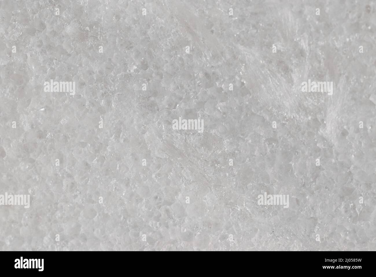 Natural stone tile in light gray color with scratches and marble effect. Stock Photo