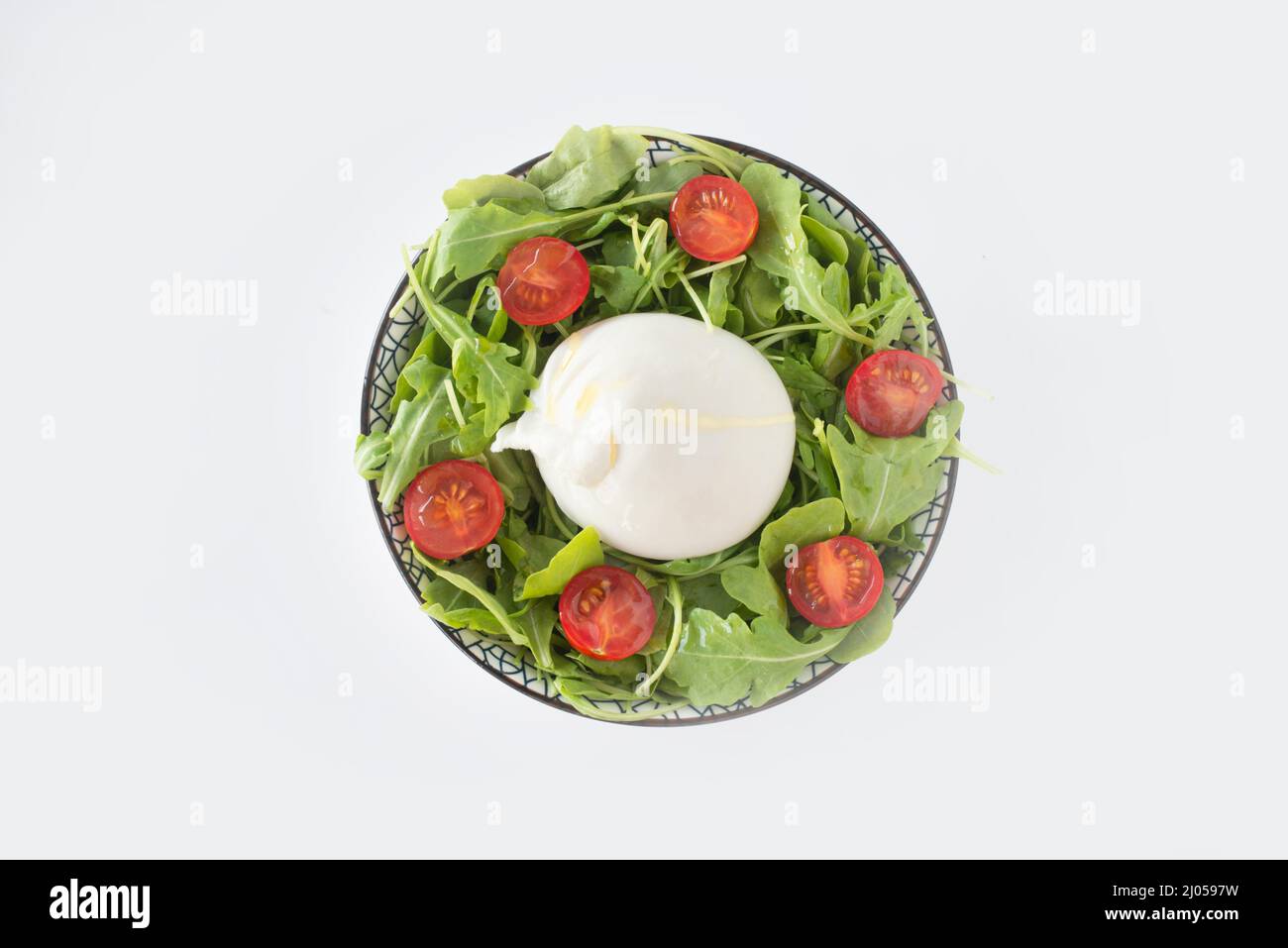 Italian style burrata salad isolated on white Stock Photo