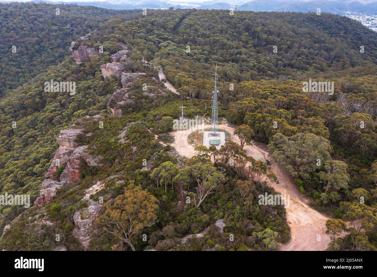 Drone aerial photograph of a large tower in a forest
