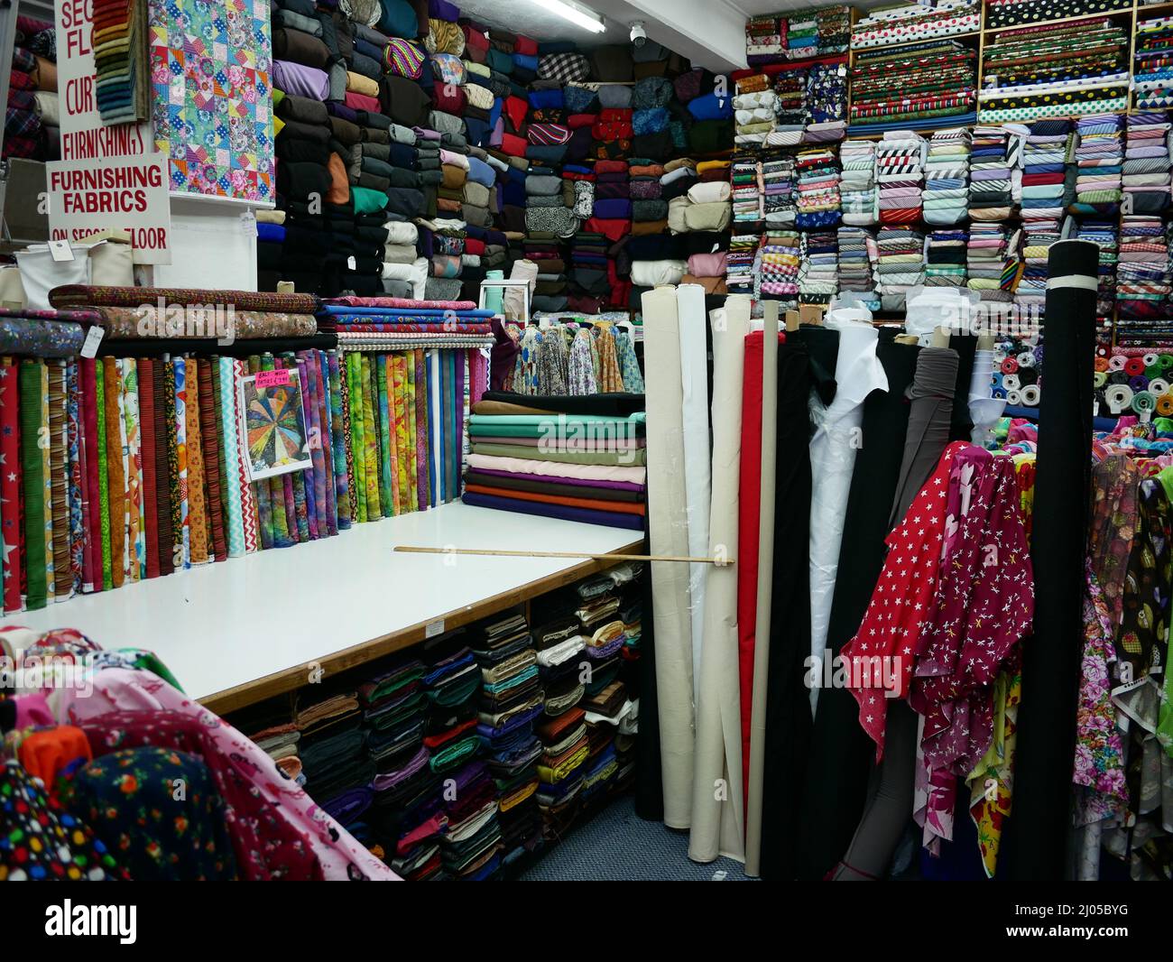 Fabric store interior of fabric shop, Birmingham, UK Stock Photo