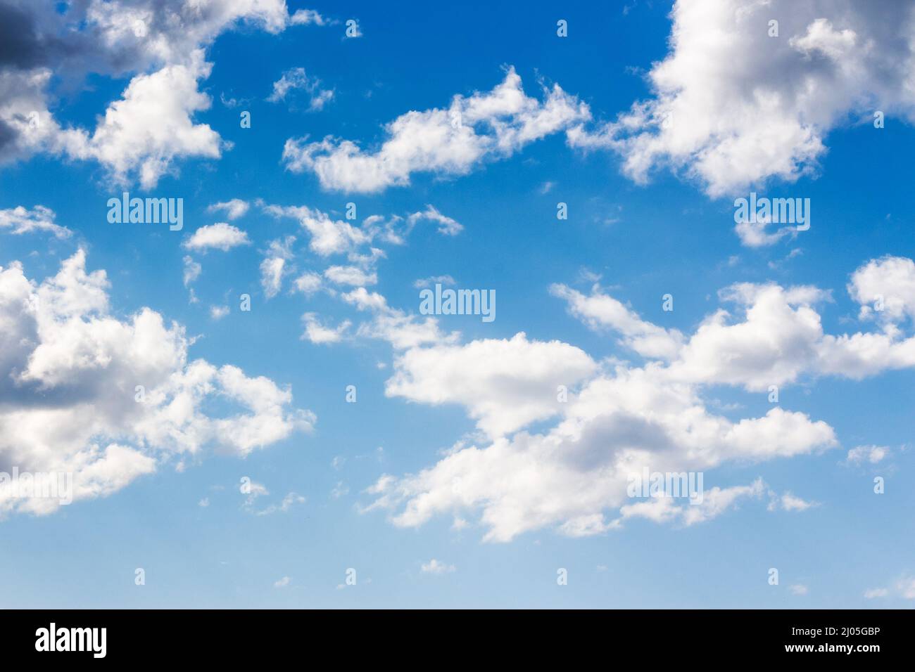 blue sky and white clouds on a sunny weather. atmosphere air freedom concept. nature series in spring. creative gradient background for installation a Stock Photo