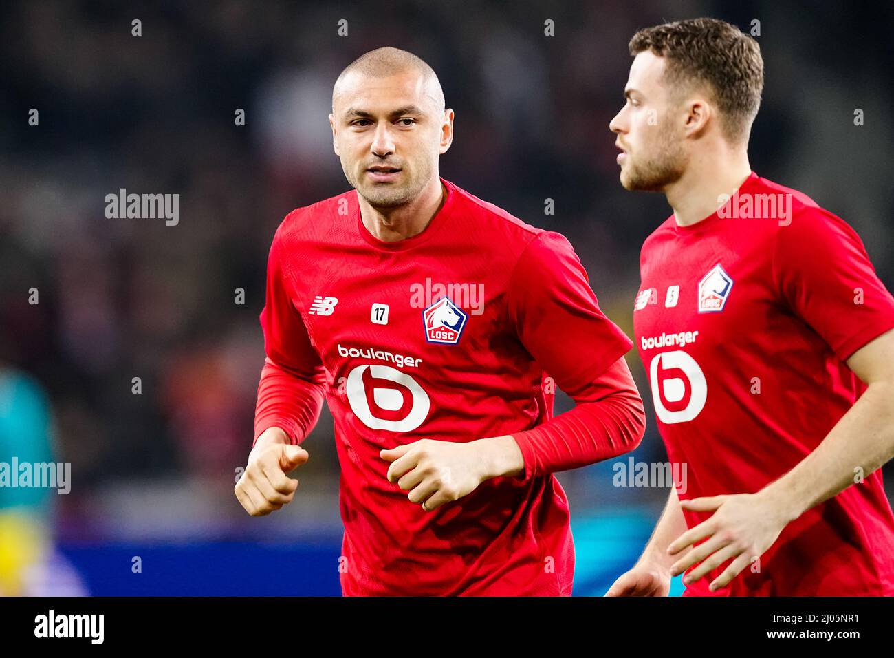 LILLE, FRANCE - MARCH 16: Burak Yilmaz of Lille OSC warms up prior to the  UEFA Champions League Round Of Sixteen Leg Two match between Lille OSC and  Chelsea FC at Stade