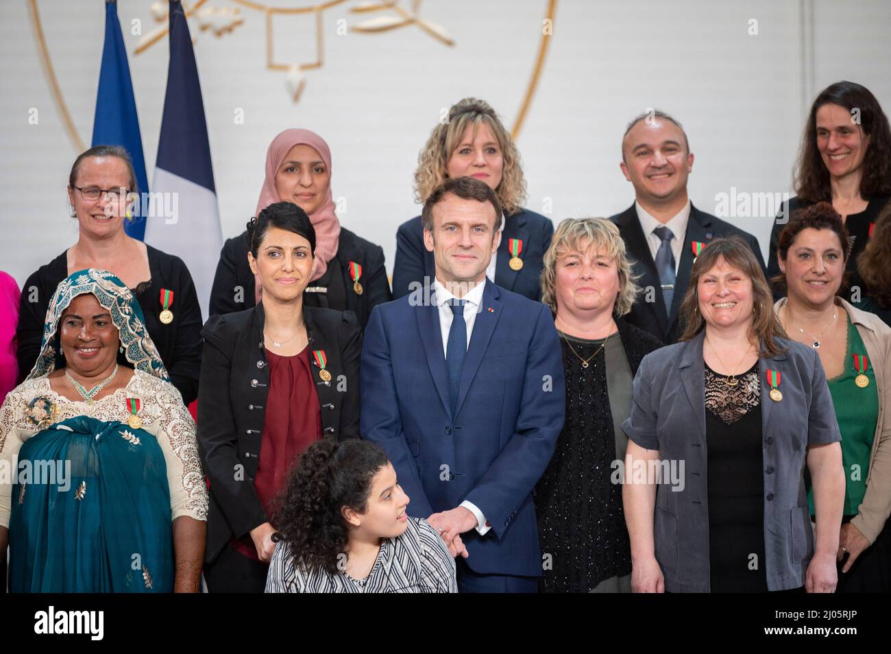 French President Emmanuel Macron and Brigitte Macron during the award