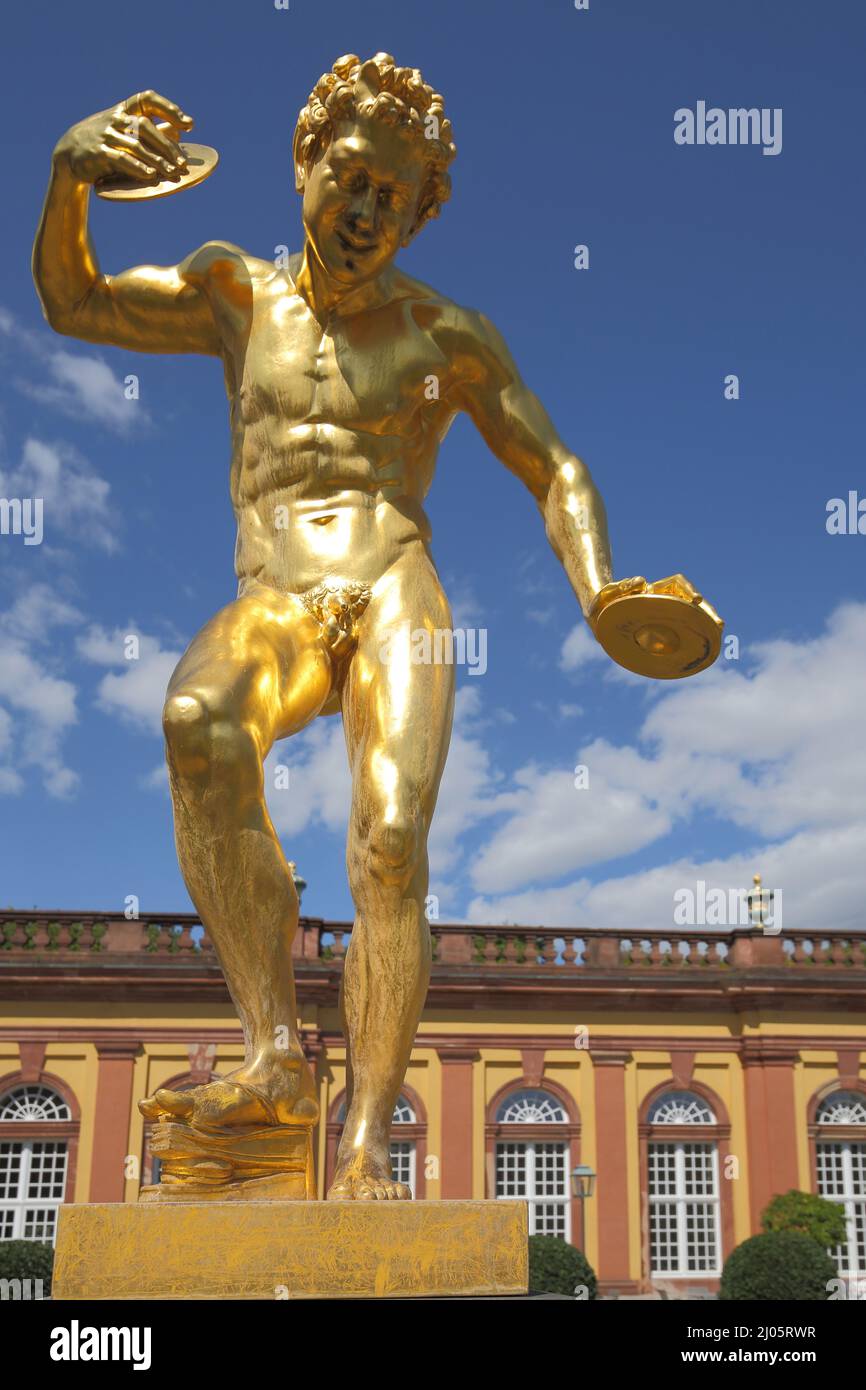 Golden satyr statue in the palace gardens in Weilburg, Hesse, Germany ...