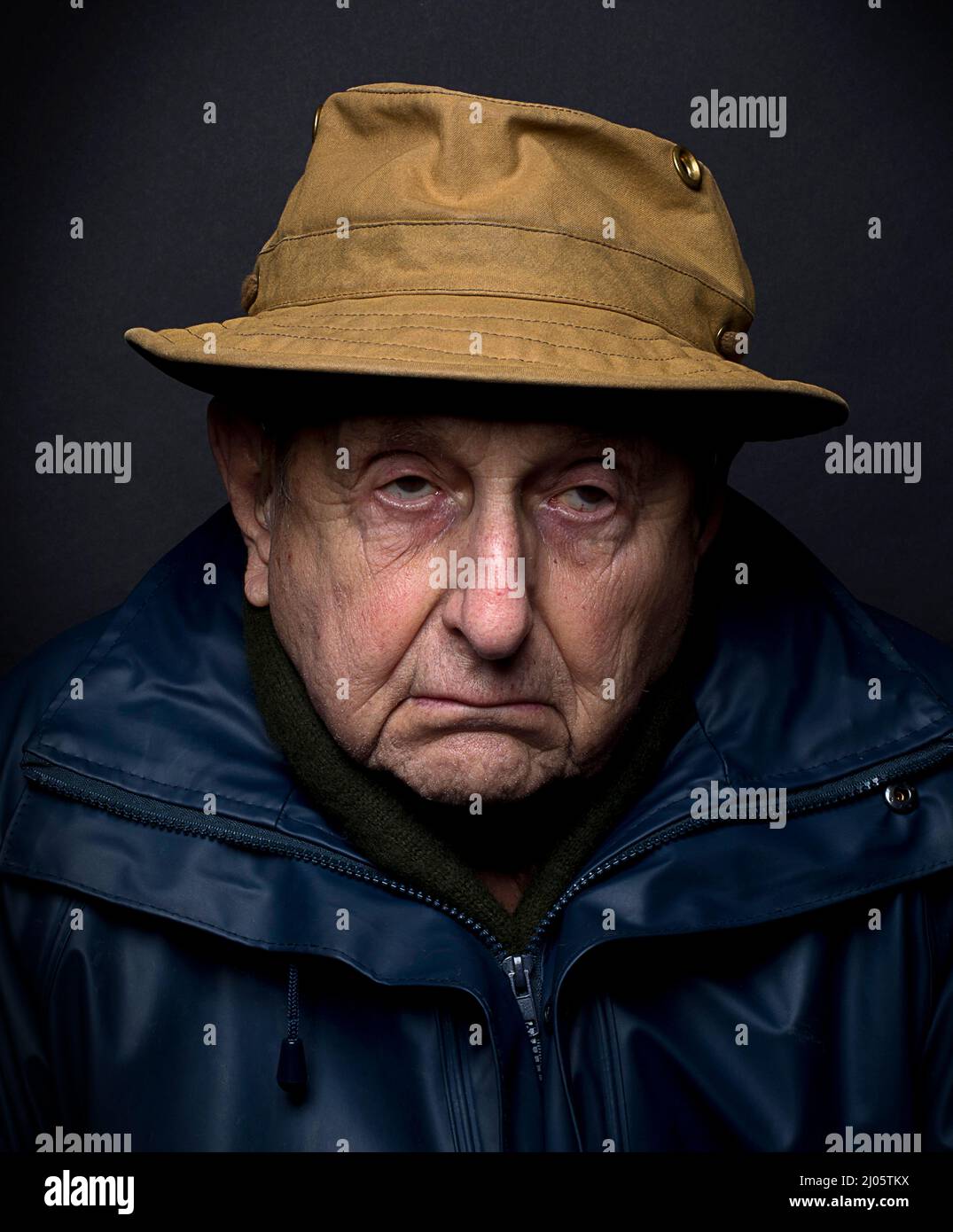 Unhappy Old Man Stock Photo