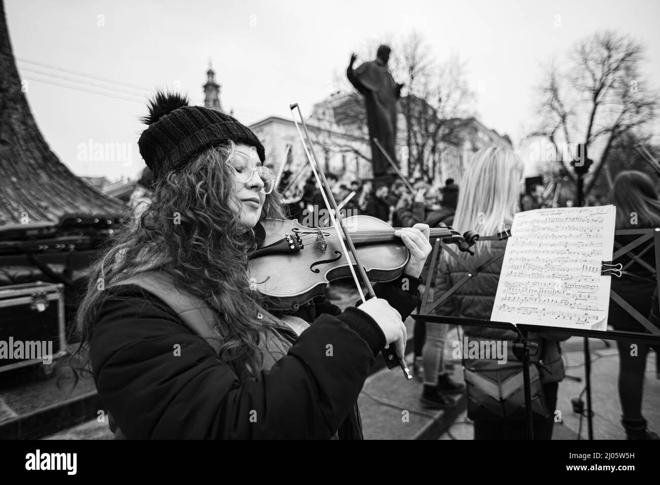 Lviv, Ukraine - March 16, 2022: INSO-Lviv Symphony Orchestra of Lviv National Philharmonic Society performed on Svobody Avenue in Lviv as part of the Stock Photo