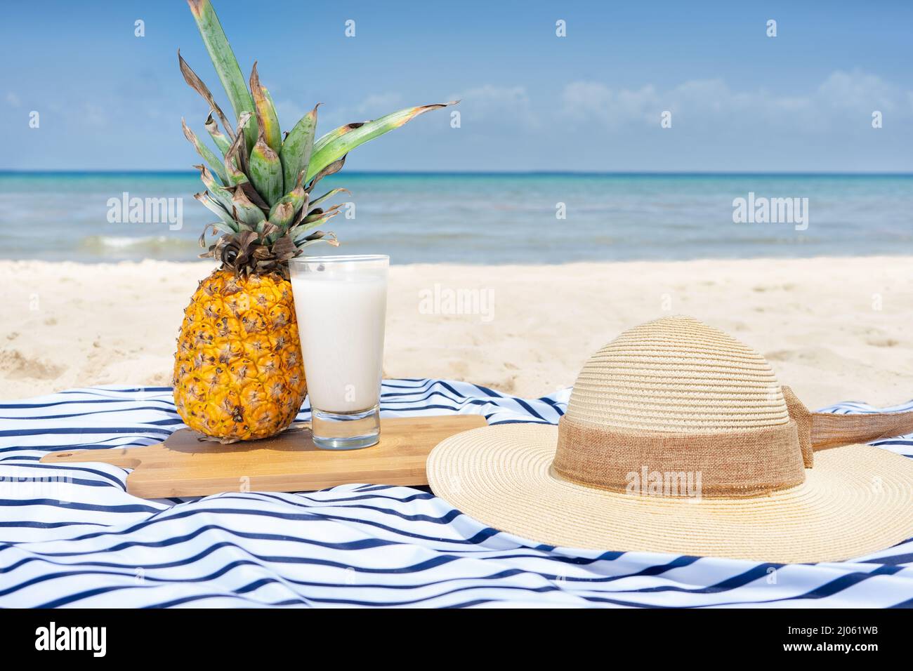 Piña colada drink at the beach Stock Photo - Alamy