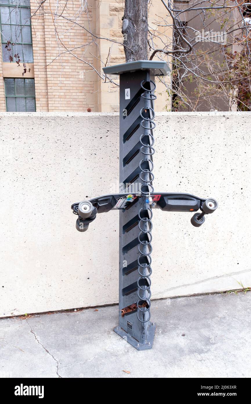 Electric skateboard rack. Stock Photo