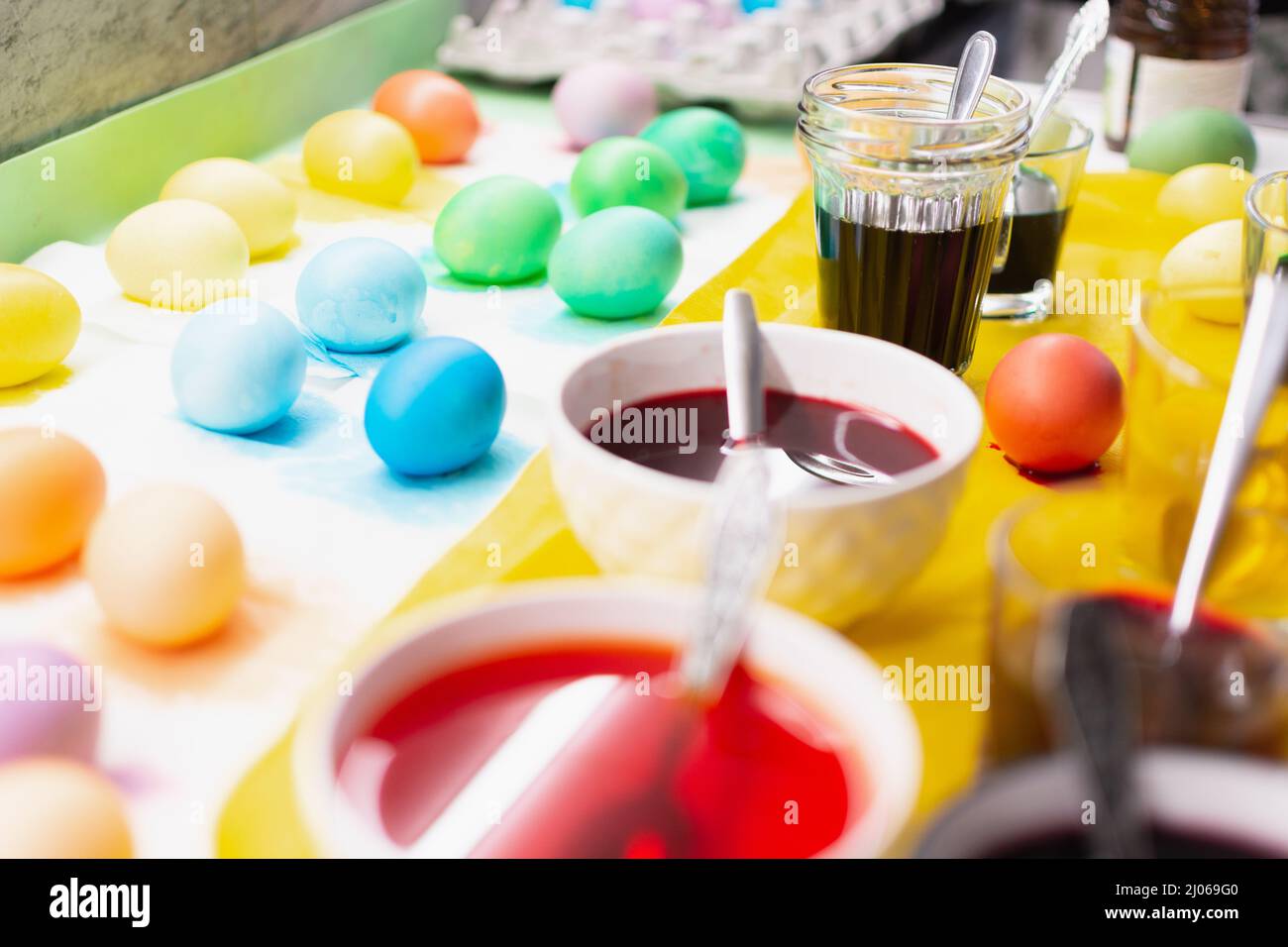 Easter colorful eggs with paint for food. Holiday decoration and preparation Stock Photo
