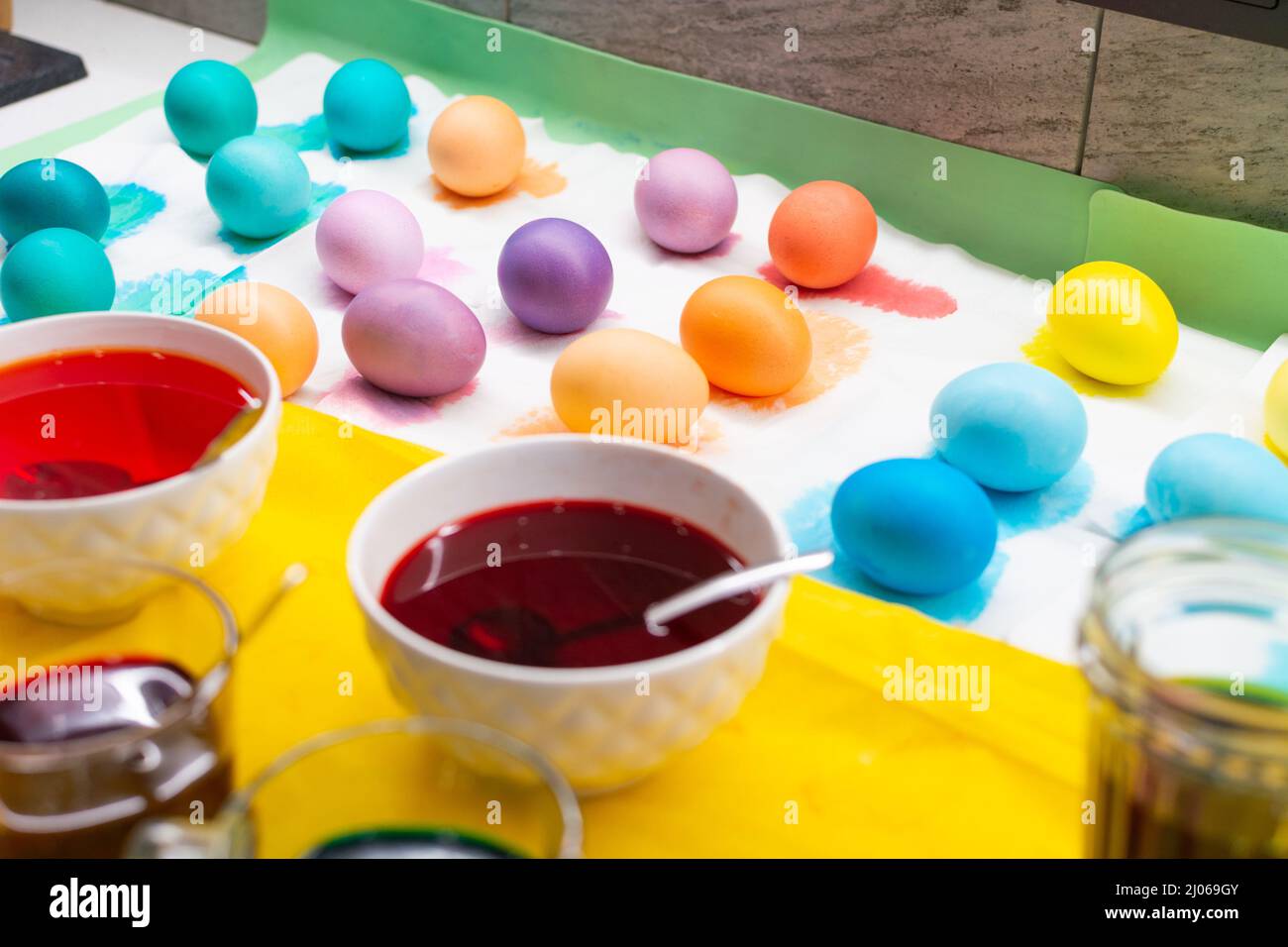 Easter colorful eggs with paint for food. Holiday decoration and preparation Stock Photo