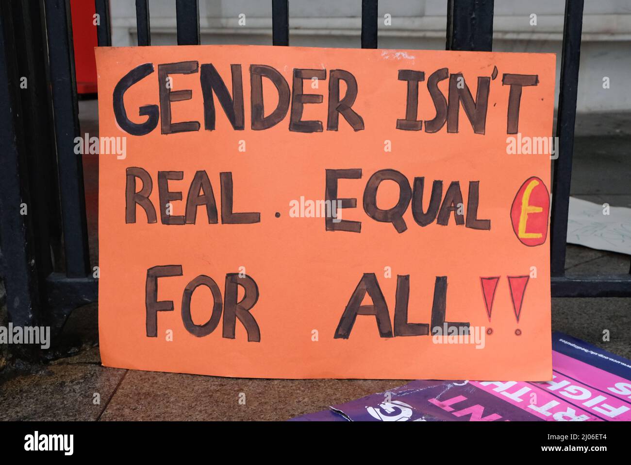 London, UK. Gender inequality pay protest placard at a strike over pension payment reduction. Stock Photo