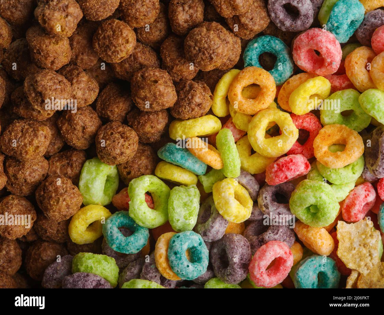 Sweet whole grain quick breakfasts - chocolate balls and fruit rings. Express food, healthy food, vitamins, carbohydrates, supermarket, banner. Close- Stock Photo