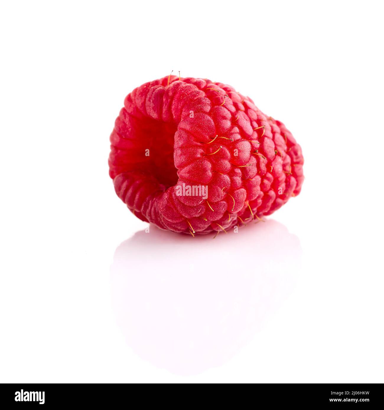 One ripe raspberry isolated on white backdrop Stock Photo