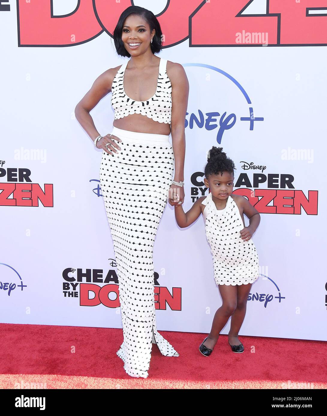 L R Gabrielle Union And Daughter Kaavia James Union Wade At Disney S Cheaper By The Dozen World Premiere Held At The El Capitan Theater In Hollywood Ca On Wednesday March 16 22 Photo