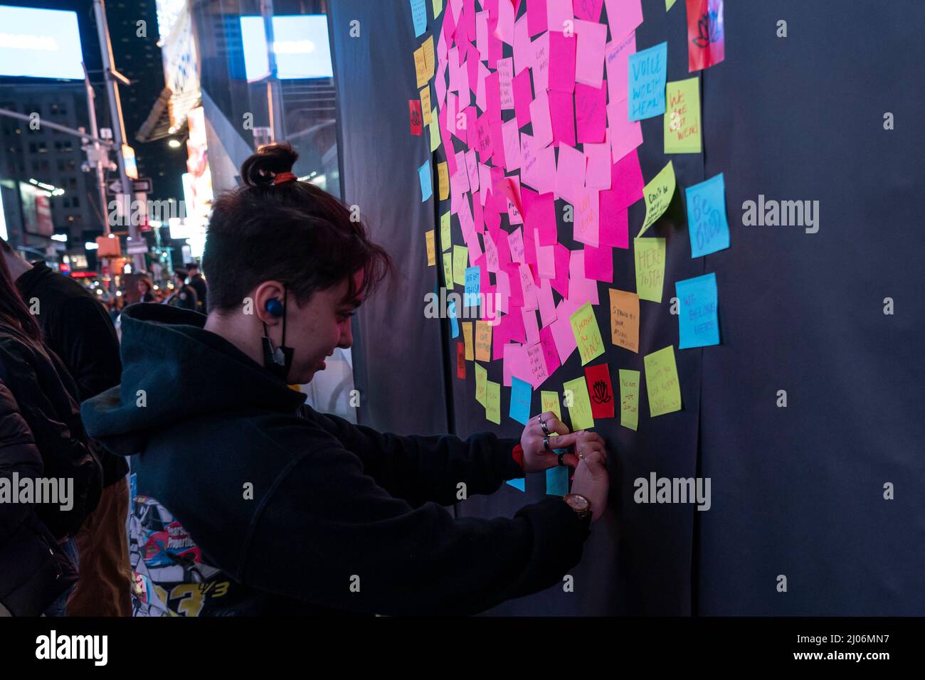 New York, NY March 16, 2022 A woman attached message in support of