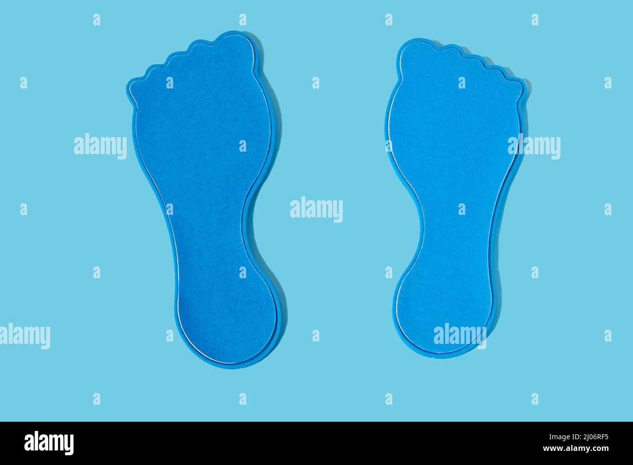 Pedicure kit. Two pedicure graters in the form of feet Stock Photo Alamy