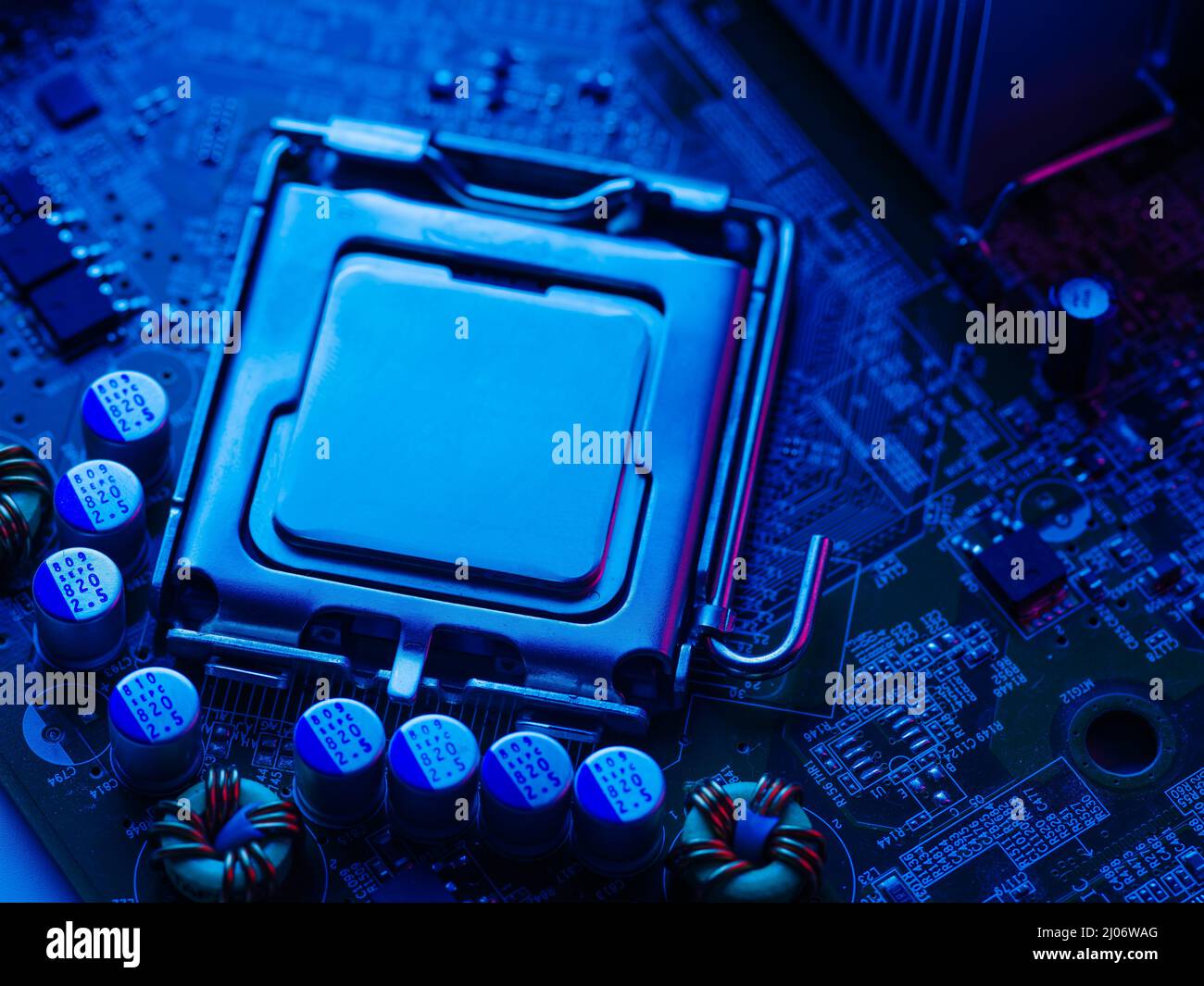 Processor, desktop microprocessor on a blue surface close-up. Semiconductor contacts and connectors. Electronic and computer equipment. Hardware, repa Stock Photo