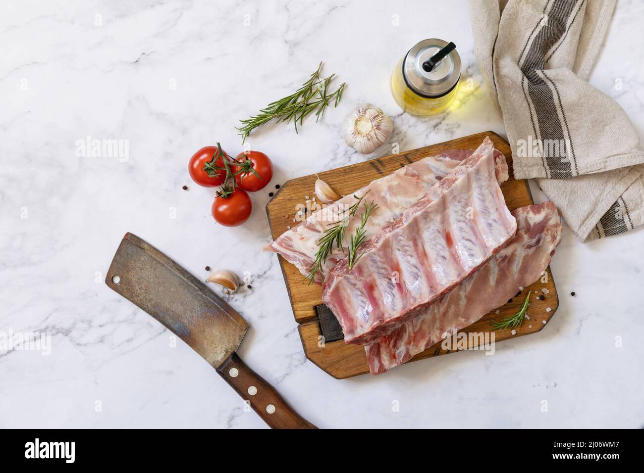 Raw veal calf brisket ribs meat with vegetable and spices on short ...
