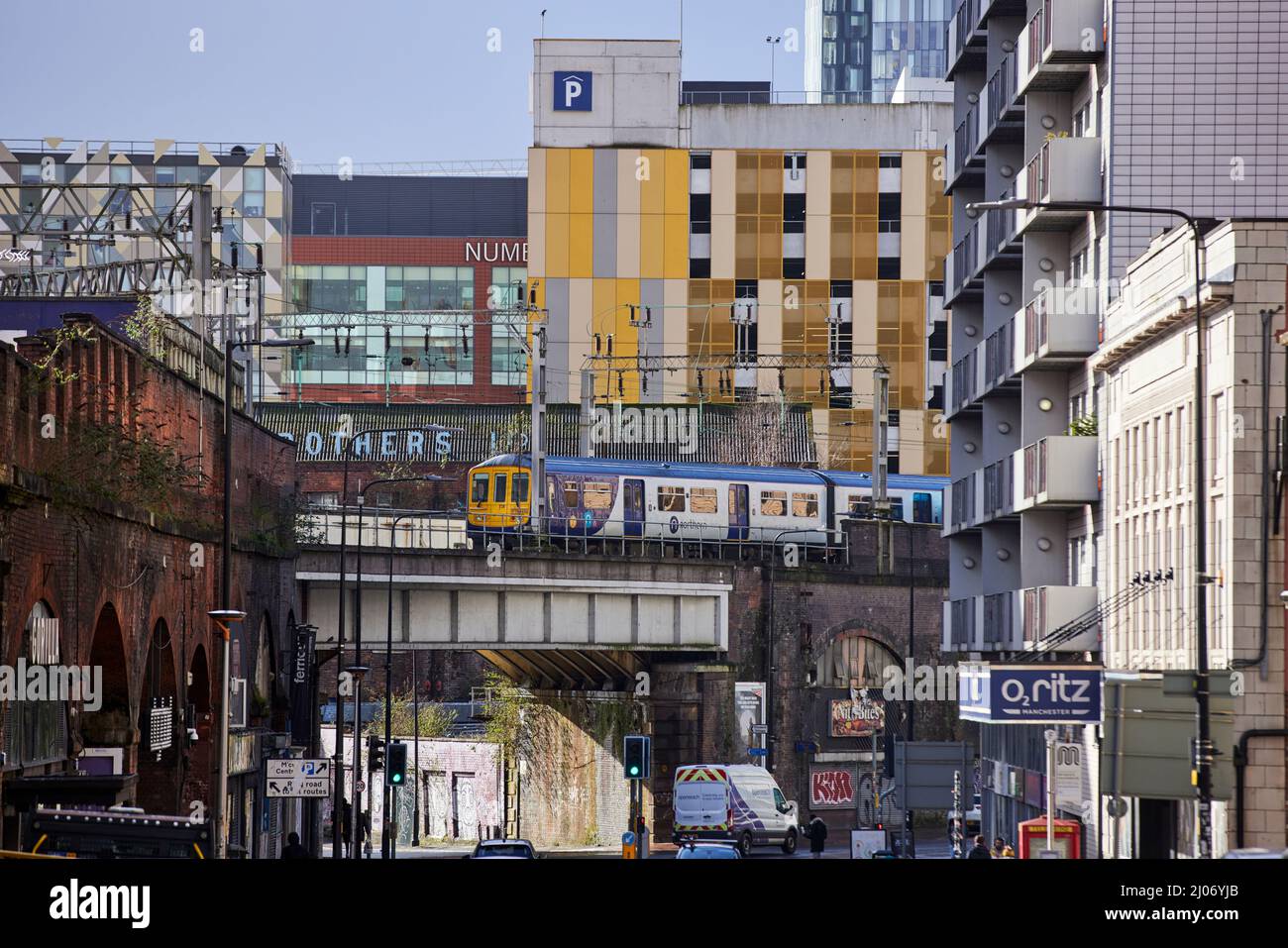 Street scene Whitworth Street Manchester, Northern train elevated track