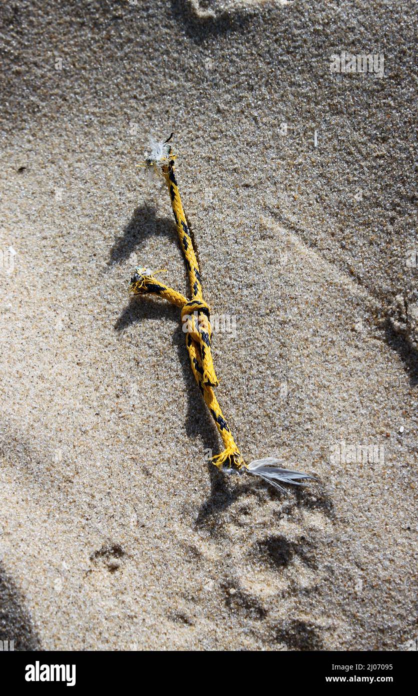 Fishing net lying on sand hi-res stock photography and images - Alamy