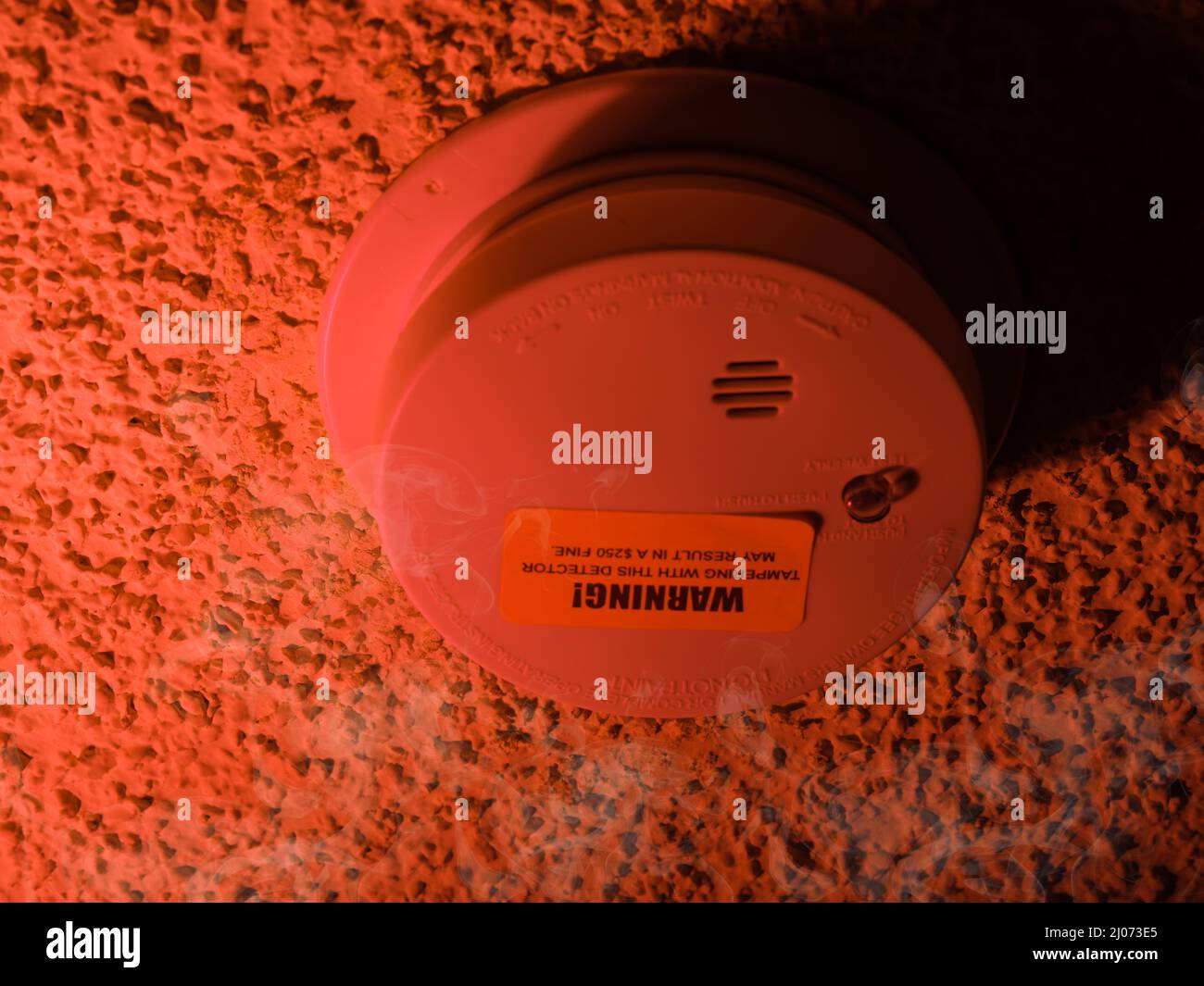 Security, burning house. Fire threat. Smoke detector and interconnected