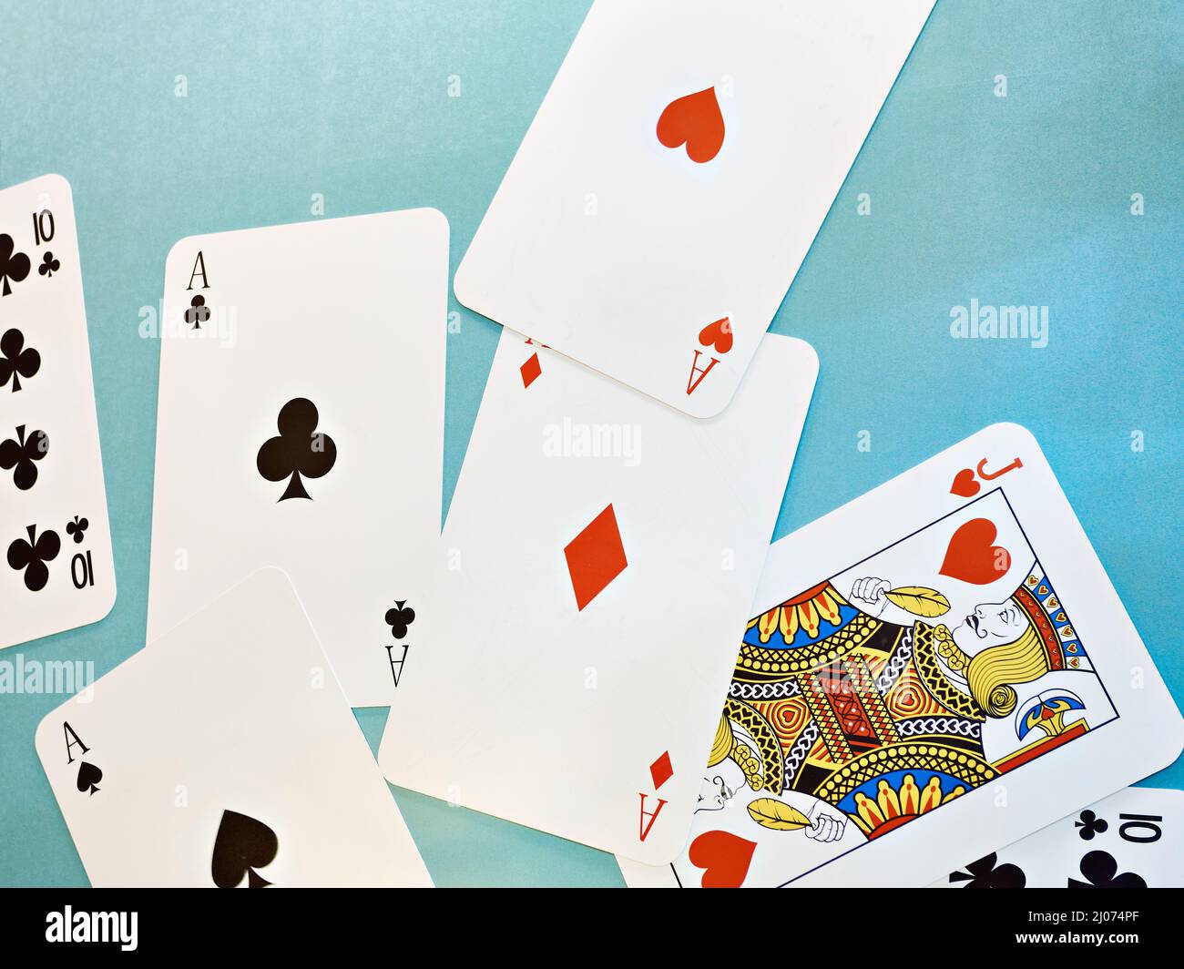 Playing cards on a blue background Stock Photo
