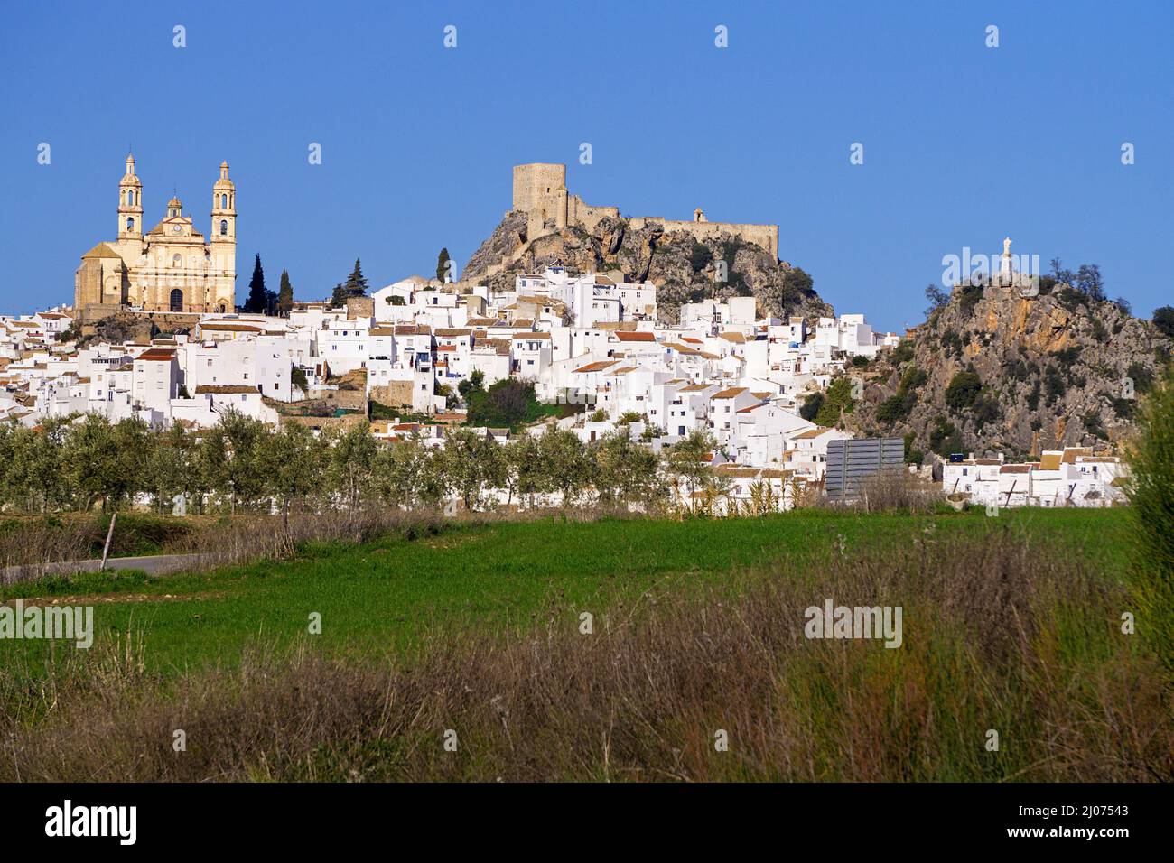The white village Olvera with castle and church Nuestra Señora de la Encarnacion, Olvera, pueblo blanco, Cadiz province, Andalusia, Spain Stock Photo