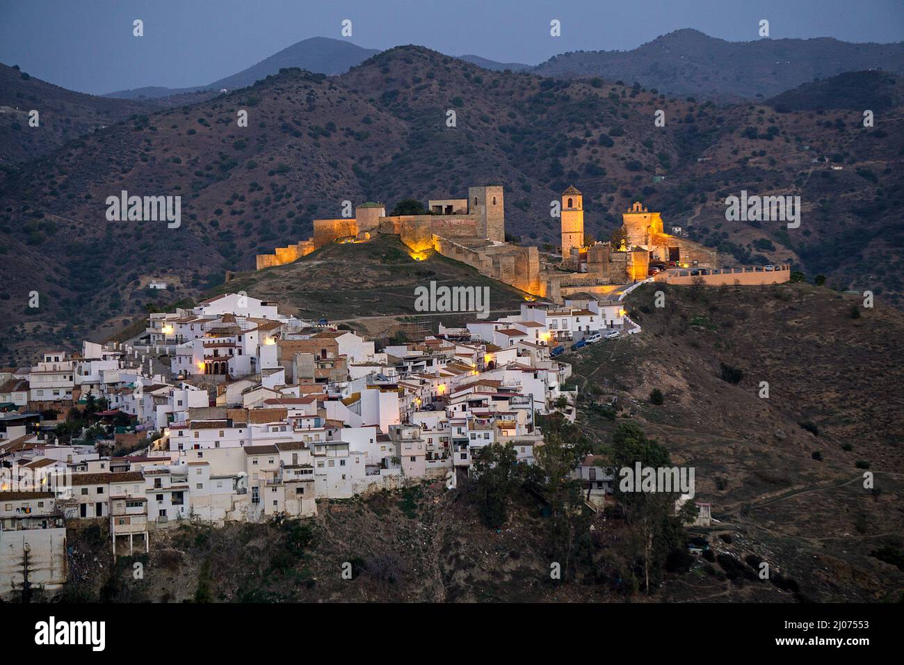 The illuminated arabic castle of Alora, pueblo blanco, Malaga province, Andalusia, Spain Stock Photo
