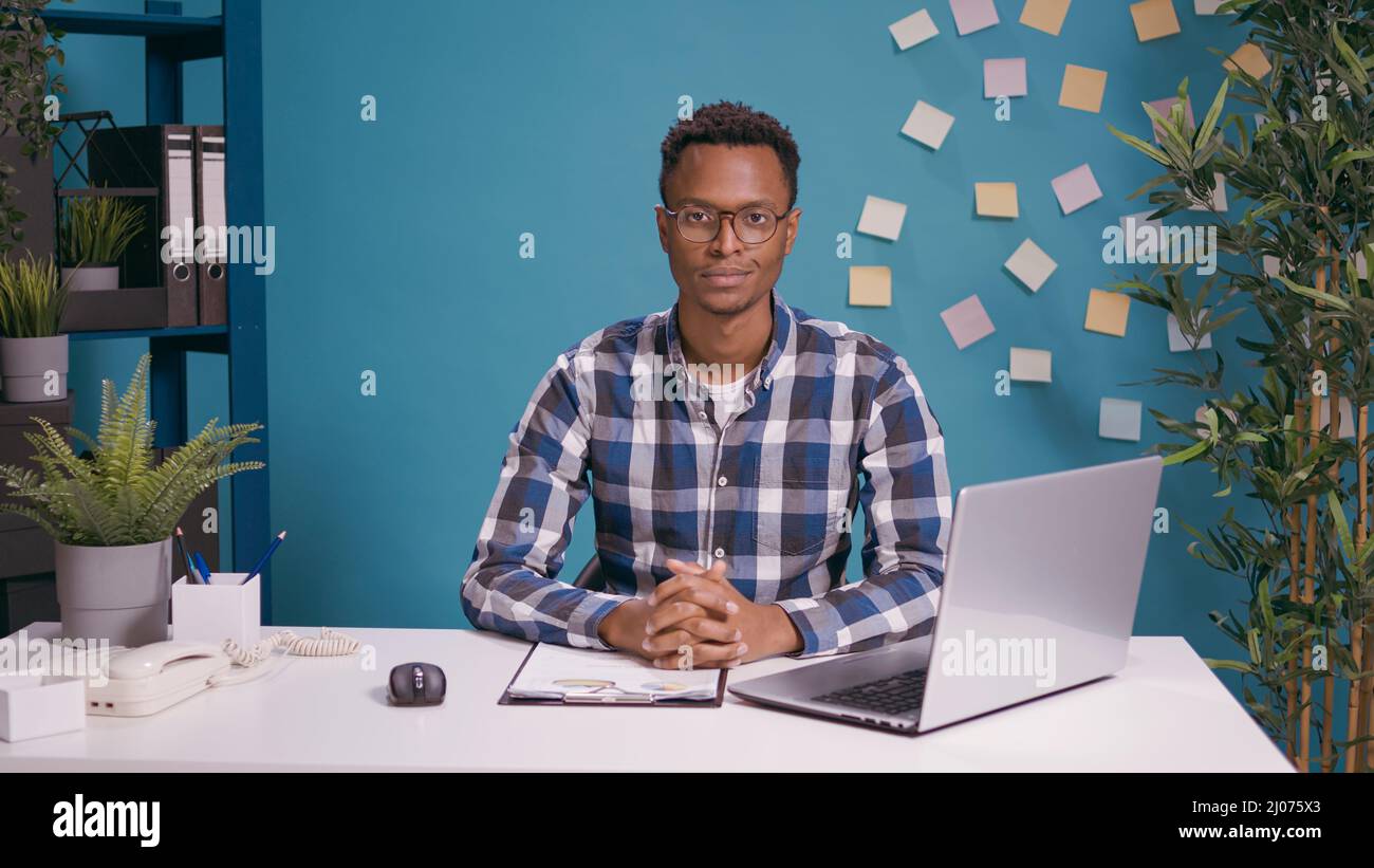 POV of businessman using online teleconference meeting on webcam