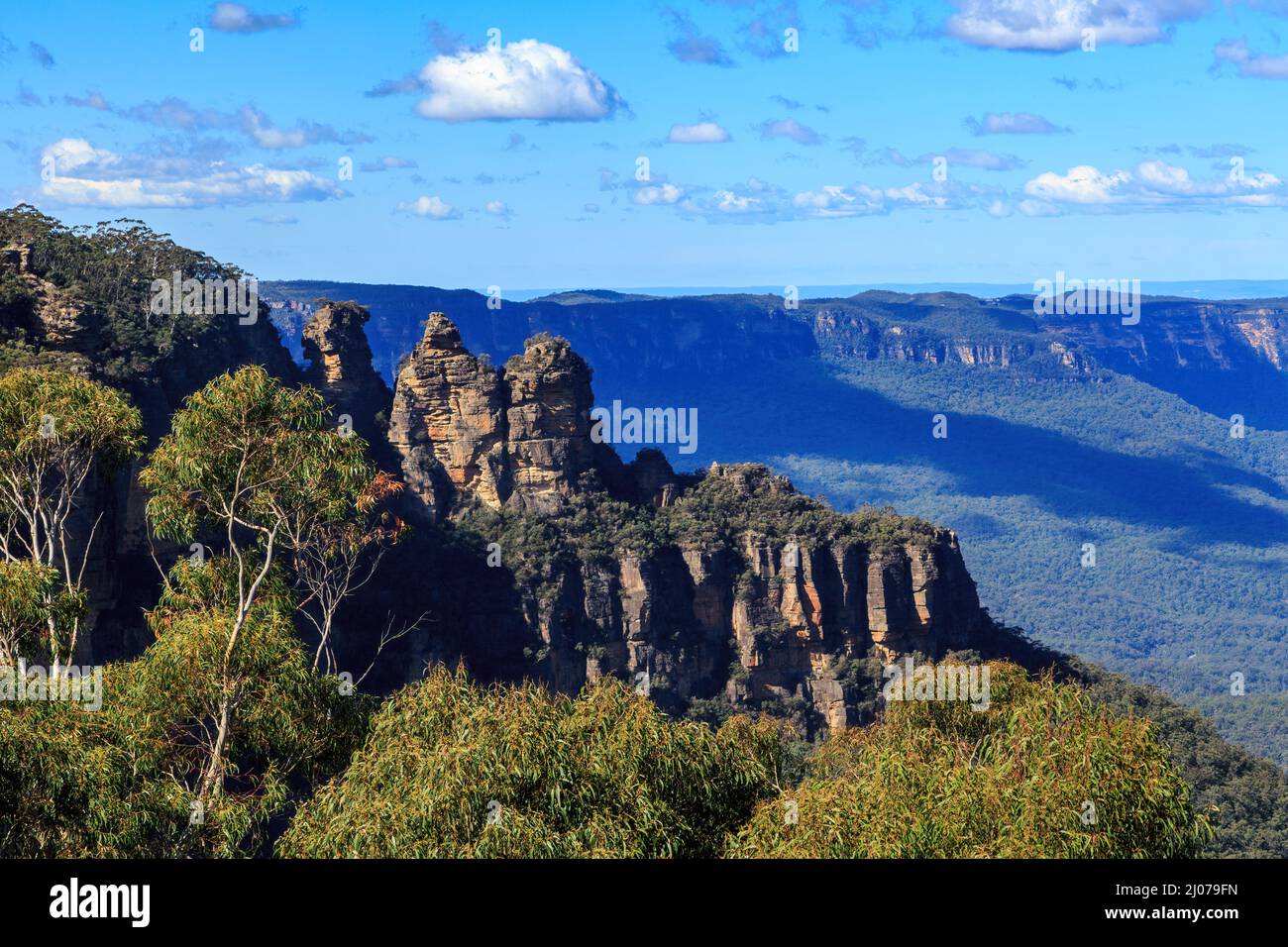 The famous 'Three Sisters' rock formation in the Blue Mountains, Australia, surrounded by eucalyptus forest Stock Photo