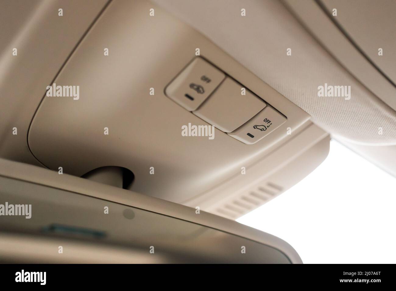 Closeup of cabin lights switch in car, light control panel inside a car