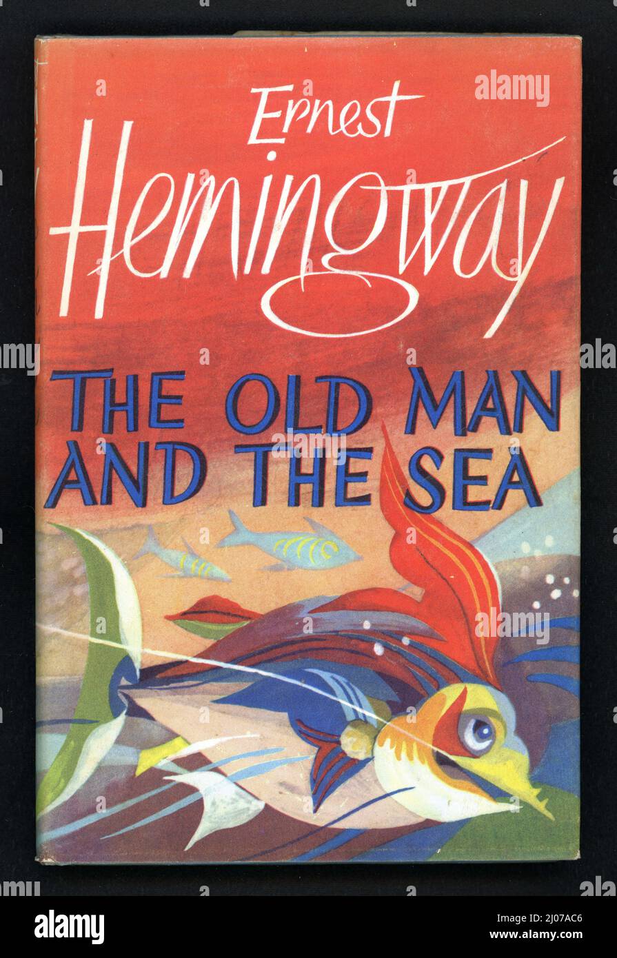 Wonderful original retro / mid-century Illustrated book cover of 'The Old Man and the Sea', published in 1952 written by famous American author, Ernest Hemingway. Illustrated by Hans Tisdall. First British publication. Stock Photo