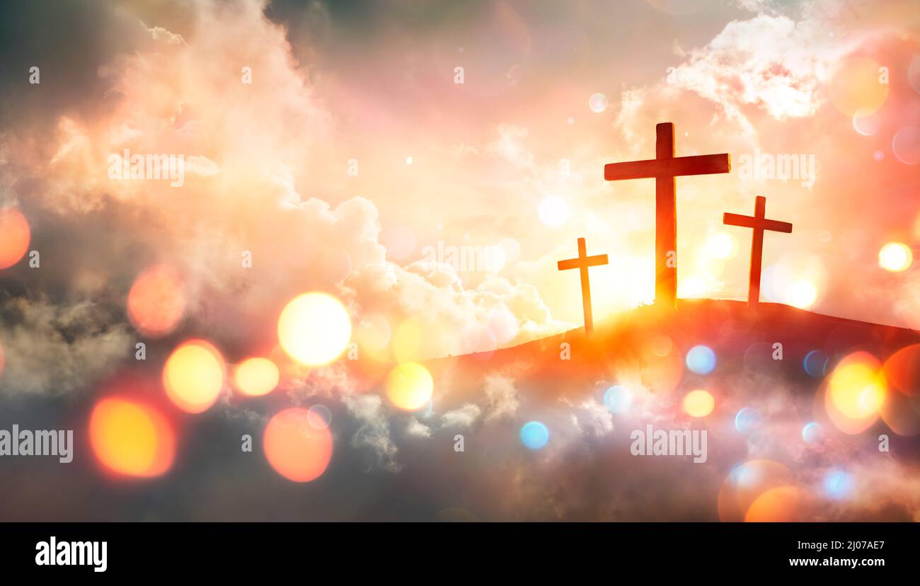 Crucifixion - Crosses At Sunset With Abstract Defocused Bokeh Lights Stock Photo