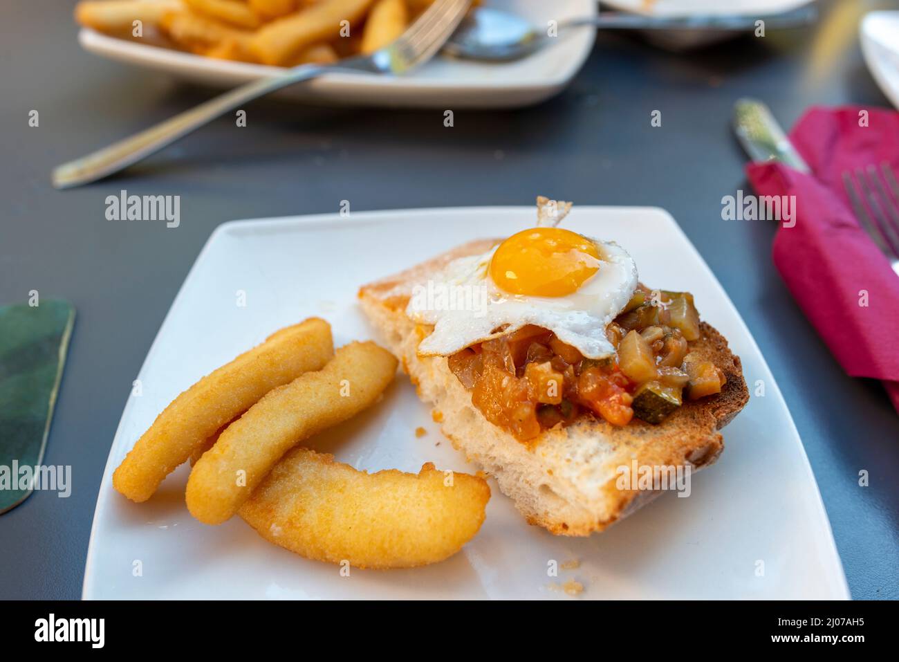 Spanish Egg and Chips with bread Stock Photo Alamy