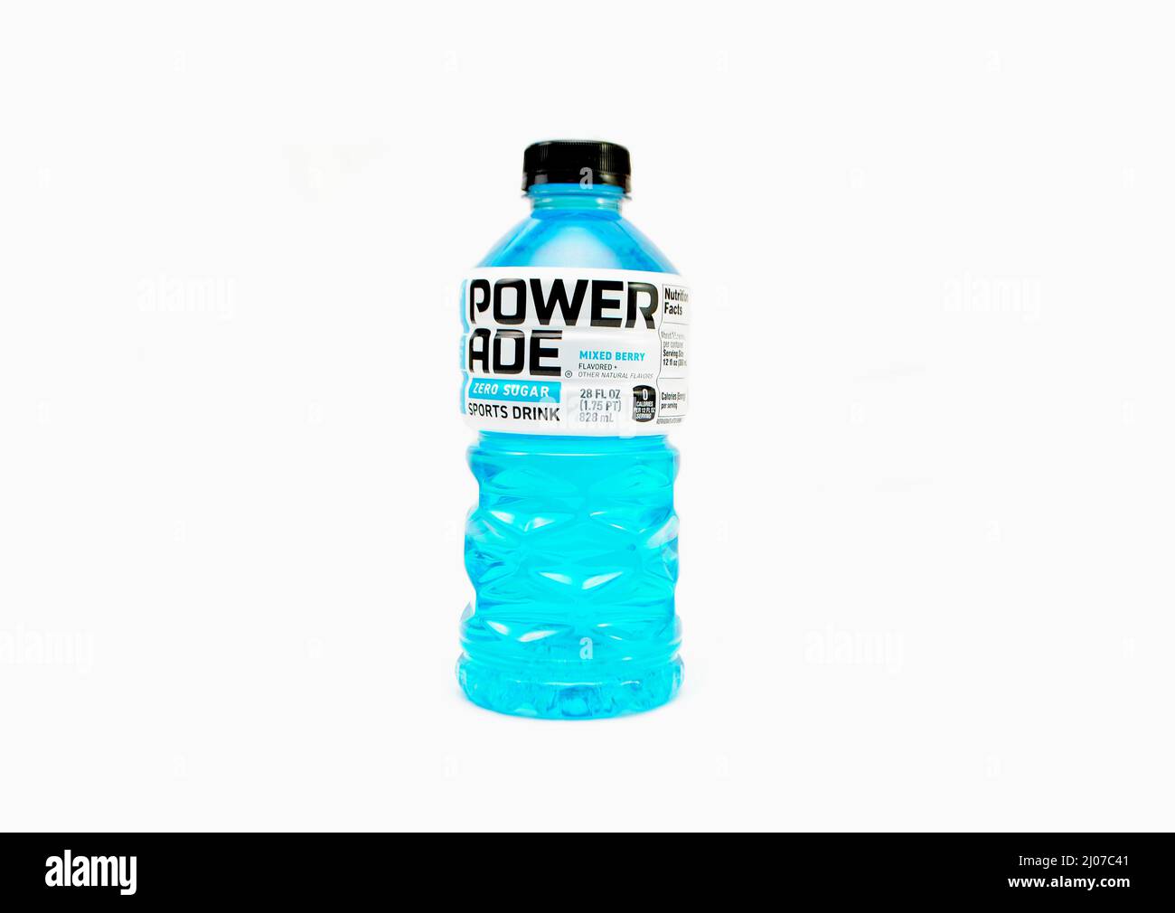 Mountain Blast flavor Isolated Over White. Powerade replenishes vitamins and electrolytes lost during physical activities. Powerade is a division of C Stock Photo