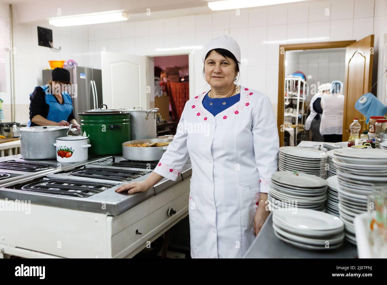 BEREHOVE, UKRAINE - MARCH 16, 2022 - Chef Ivanna Kobylianska is pictured in the kitchen of Gabriel Bethlen Berehove Lyceum that houses internally disp Stock Photo