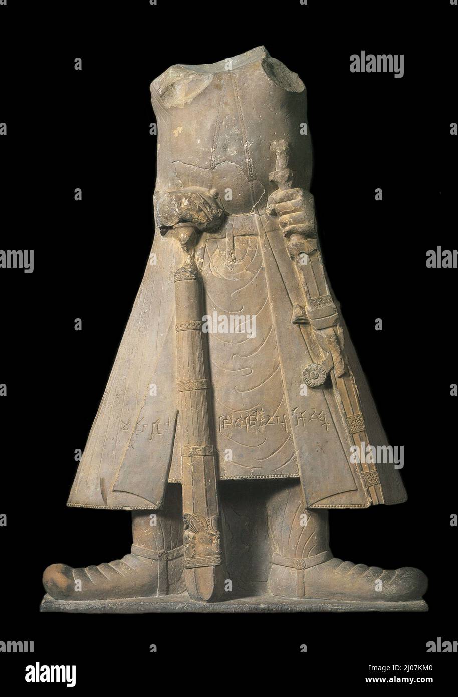 Statue of the emperor Kanishka with inscriptions in Brahmi Script