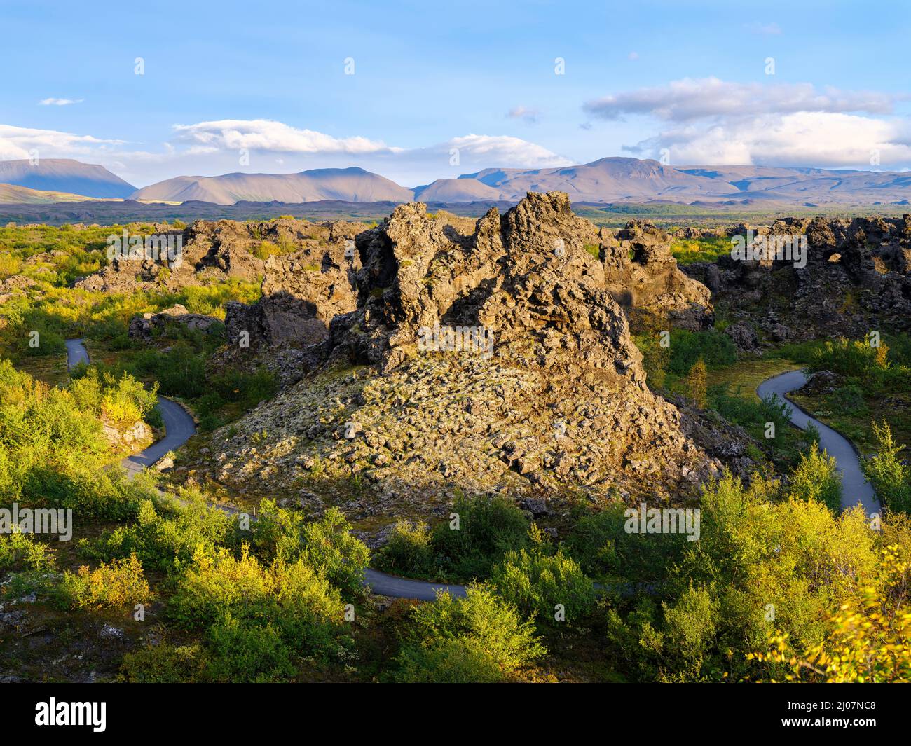 Dimmuborgir lava field, rock formations created by cooling of lava while flowing over wetlands and ponds. Landscape at lake Myvatn. Europe, Northern E Stock Photo