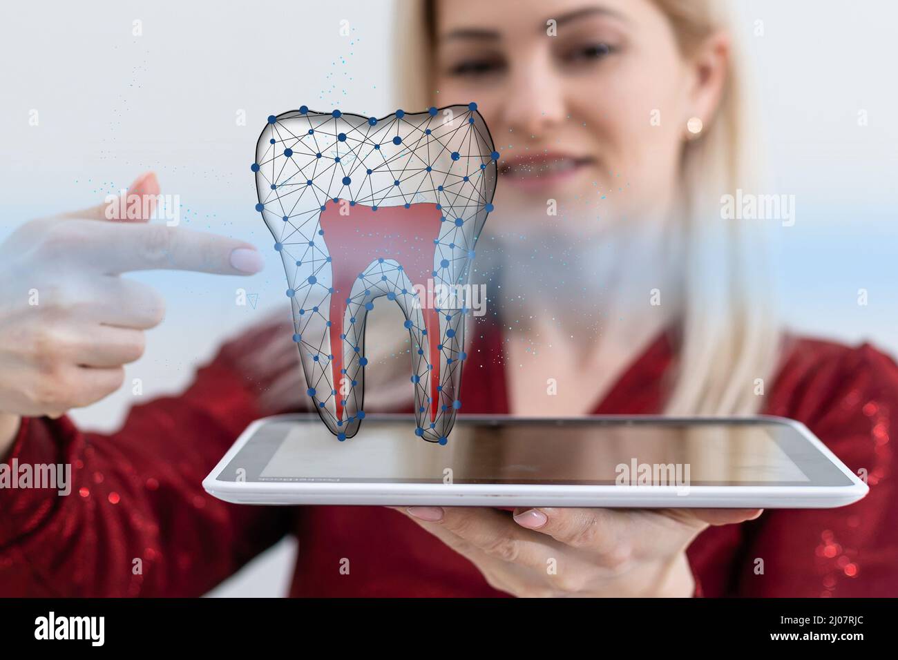Image of a neon hologram tooth. Medicine concept, new technologies