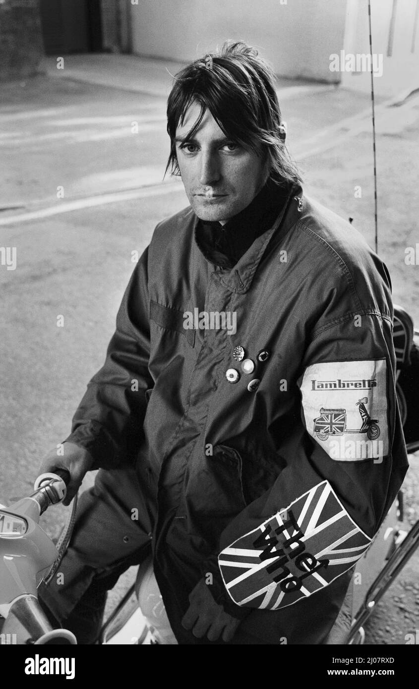 GREAT BRITAIN / England /young mod on wearing a parka sitting on  scooter . Stock Photo
