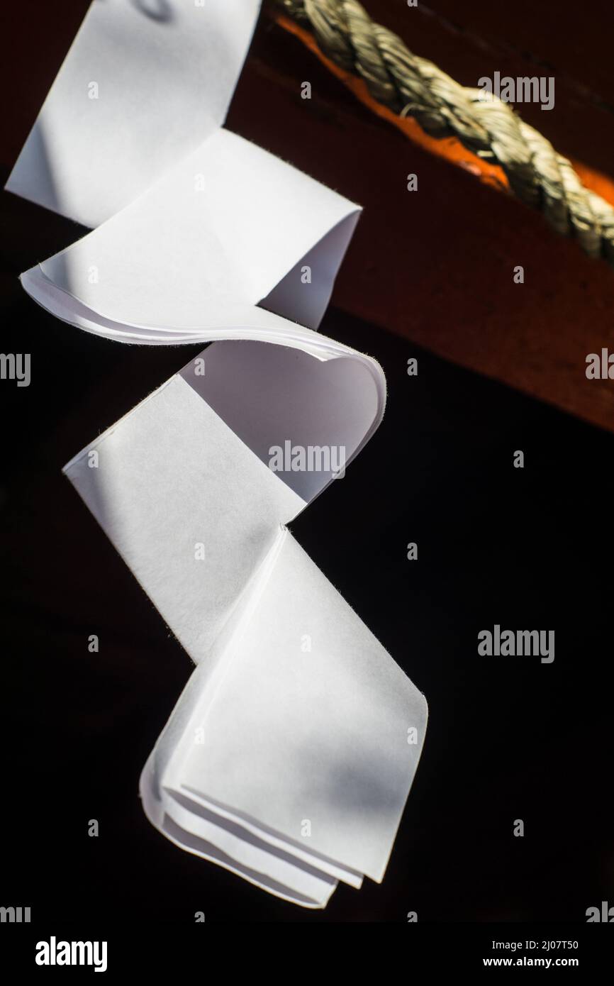 Close up detail of Japanese paper zigzag Shide streamer hanging