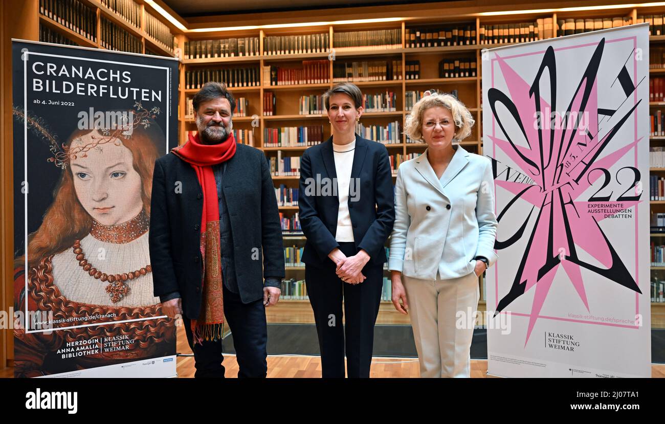 Weimar, Germany. 17th Mar, 2022. The new directors of the Klassik Stiftung Weimar, Friederike von Rosenberg (M, Directorate Palaces, Gardens and Buildings), Annette Ludwig (r, Directorate Museums), and the new director Dirk Wintergrün (Directorate Digital Transformation) stand together in the study center of the Duchess Anna Amalia Library before the start of the foundation's annual press conference. Founded in 2003, the Klassik Stiftung Weimar is Germany's second largest cultural foundation. Credit: Martin Schutt/dpa-Zentralbild/dpa/Alamy Live News Stock Photo