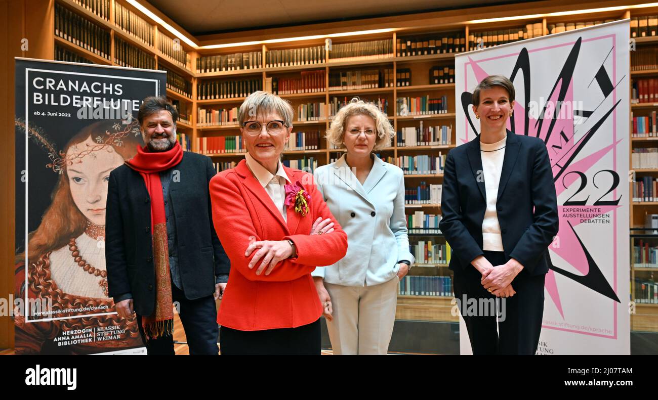 17 March 2022, Thuringia, Weimar: Ulrike Lorenz (2nd from left), President of the Klassik Stiftung Weimar, and the new Directors Friederike von Rosenberg (r, Directorate Palaces, Gardens and Buildings), Annette Ludwig (2nd from right, Directorate Museums), and the new Director Dirk Wintergrün (Directorate Digital Transformation) stand together before the start of the Foundation's annual press conference in the Study Center of the Herzogin Anna Amalia Library. Founded in 2003, the Klassik Stiftung Weimar is Germany's second largest cultural foundation. Photo: Martin Schutt/dpa-Zentralbild/dpa Stock Photo