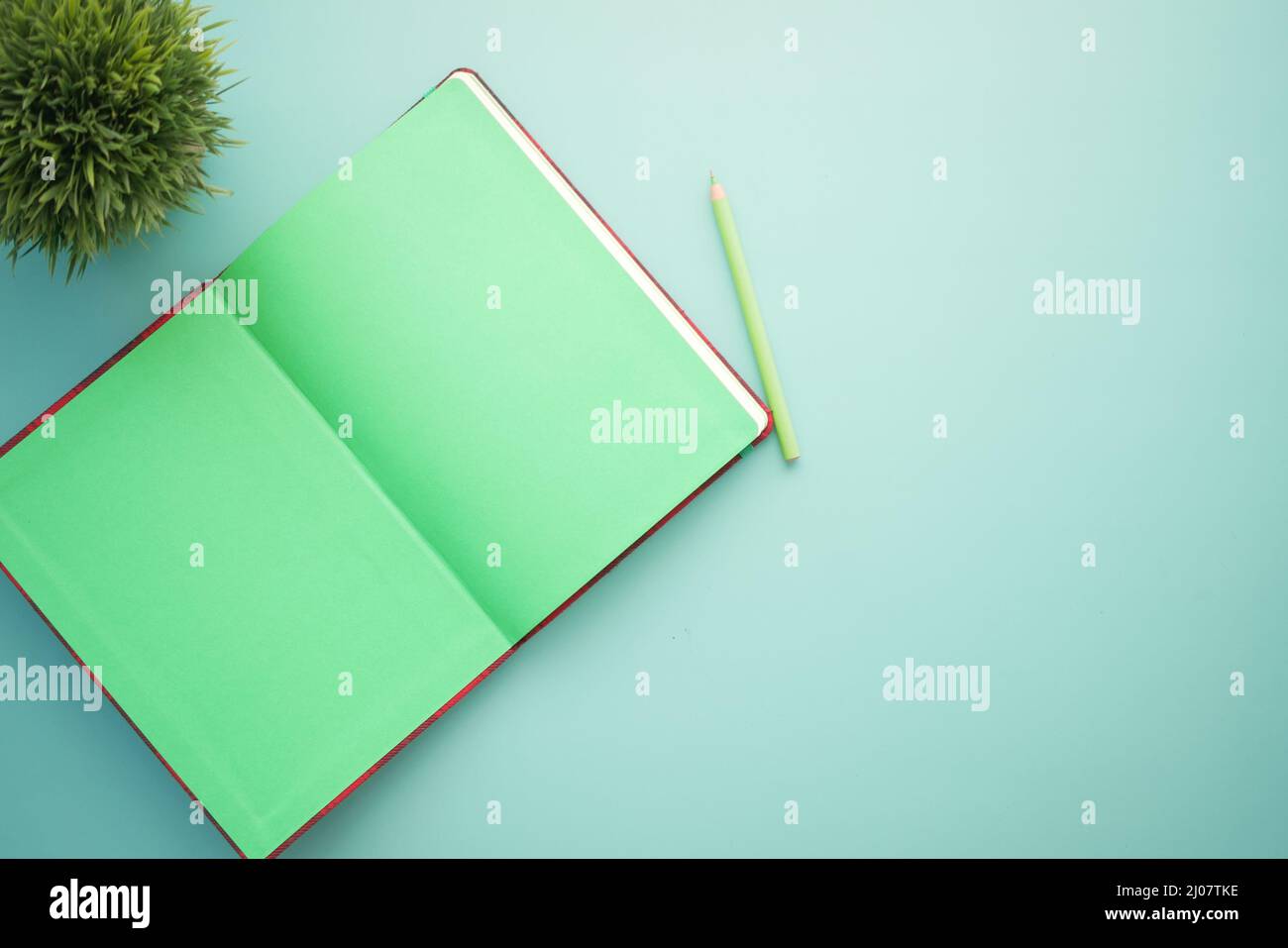 high angle view of open notepad on light color background  Stock Photo
