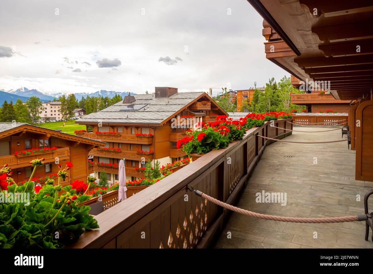 Five Stars Hotel Guarda Golf Wood Building with Balcony and Flower in Crans Montana, valais in Switzerland. *** Local Caption ***  guarda golf,buildin Stock Photo