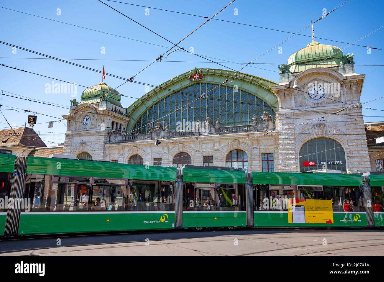 Railroad Station and Tram in a Sunny Day in Basel, Switzerland. *** Local Caption ***  tram,tramway,entrance,railroad,station,train,transportation,hol Stock Photo