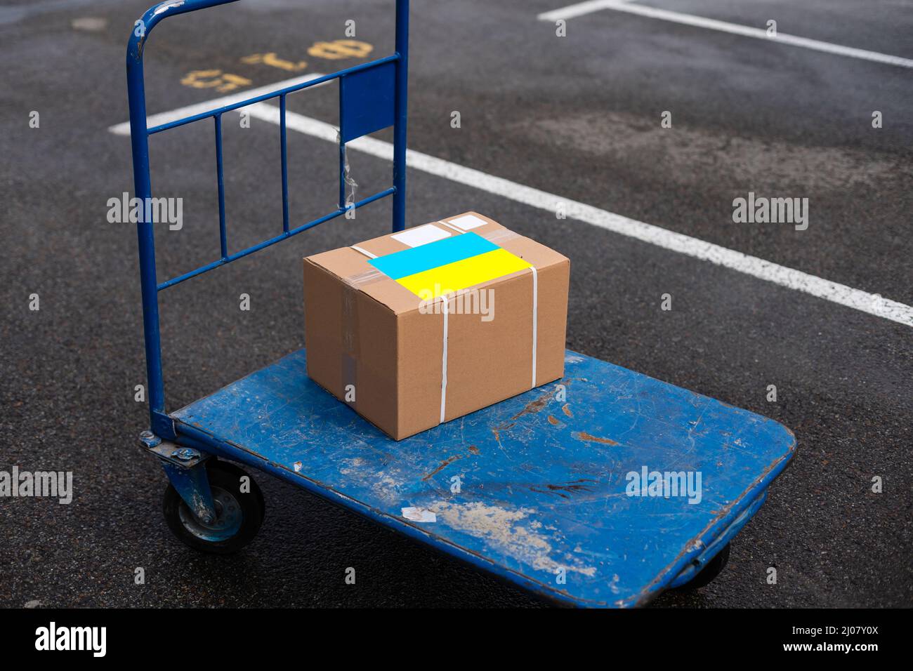 Box with donation clothes for ukrainian refugees suffering from war