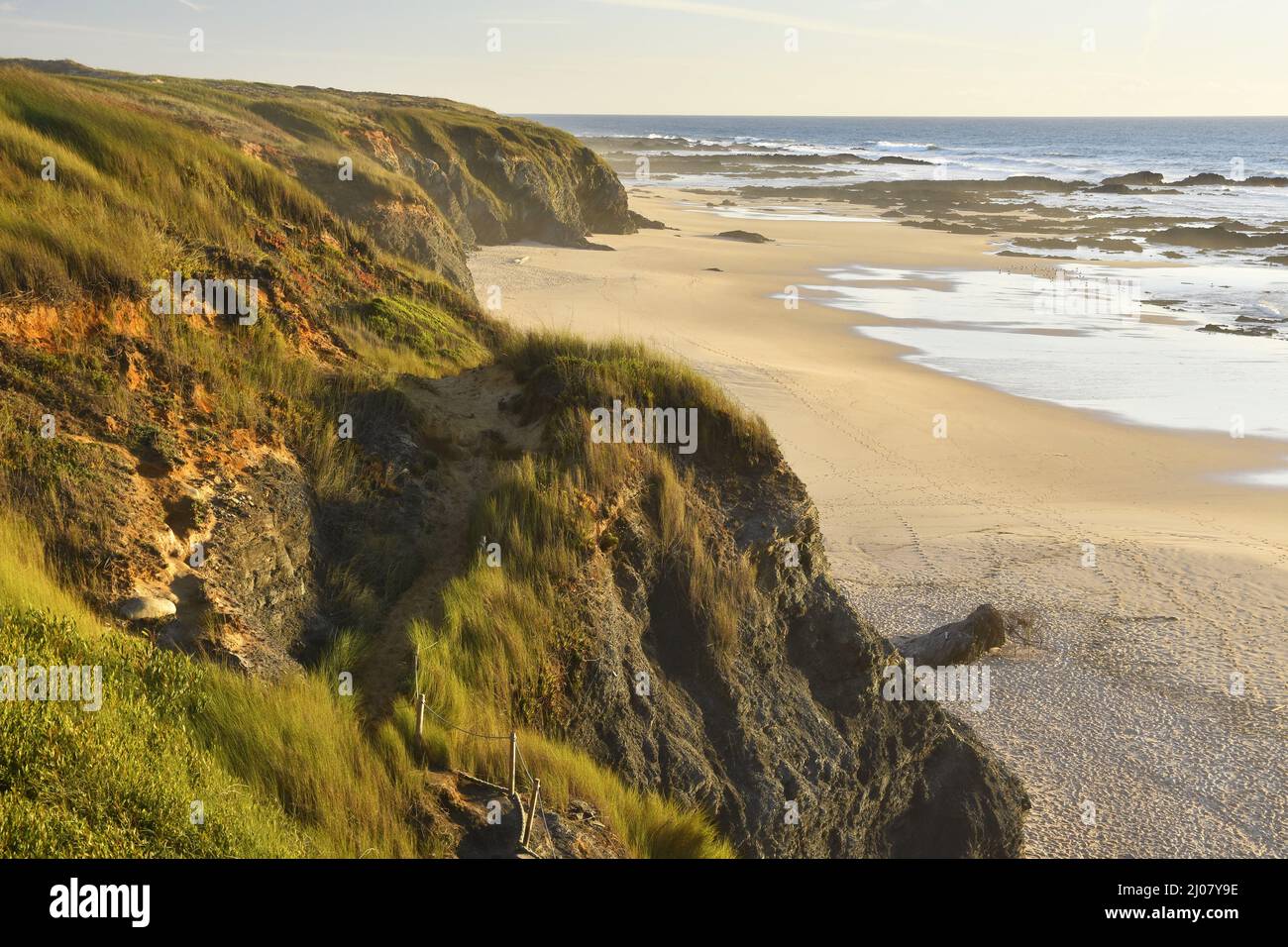 Praia do Brejo Largo beach with grassy sand dunes, Southwest Alentejo and Vicentine Coast Natural Park in the southwest of Portugal. Stock Photo