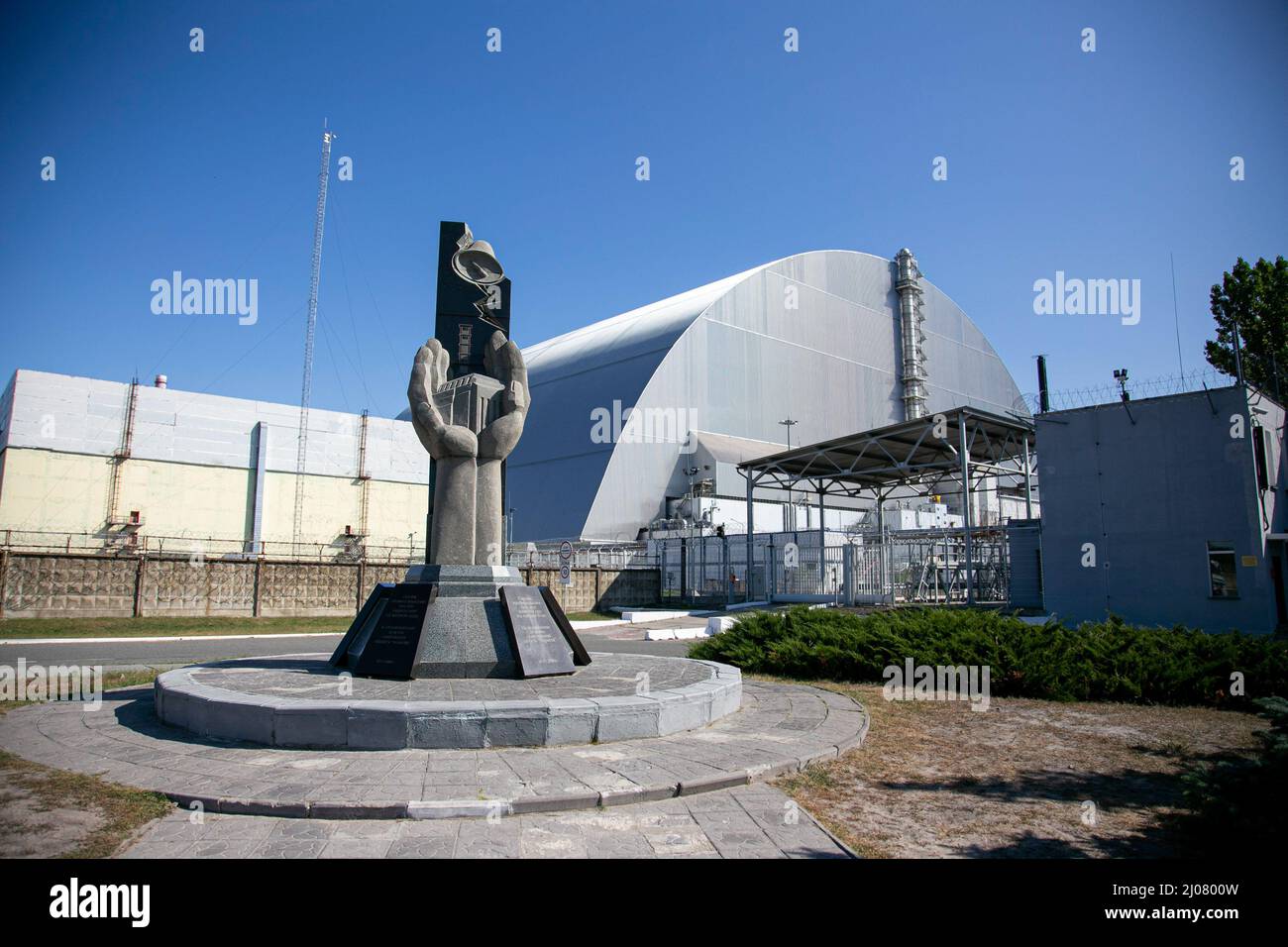 A sculpture of cupped hands holding a power plant was erected in 2006 outside of Chernobyl Nuclear Power Plant number 4 to the remembrance of the shift actions of plant workers and emergency crew who prevented what well could have been a catastrophe of global proportions. The situation of the Chernobyl nuclear plant remains at high risk according to the Ukrainian government since the Russian Force captured the area. The Russian Force repeatedly halt the energy supply to the nuclear plant which was used to cool down the core of the destroyed number 4 nuclear plant. However, the International At Stock Photo