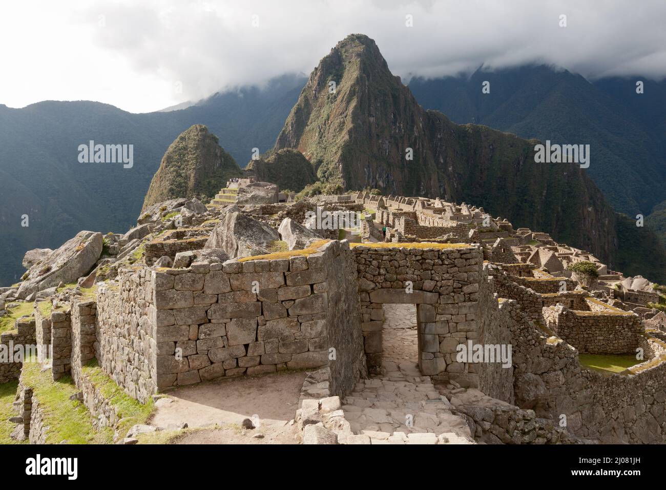Machu Picchu Inca archaeological site on the Andes Mountains, Peru ...